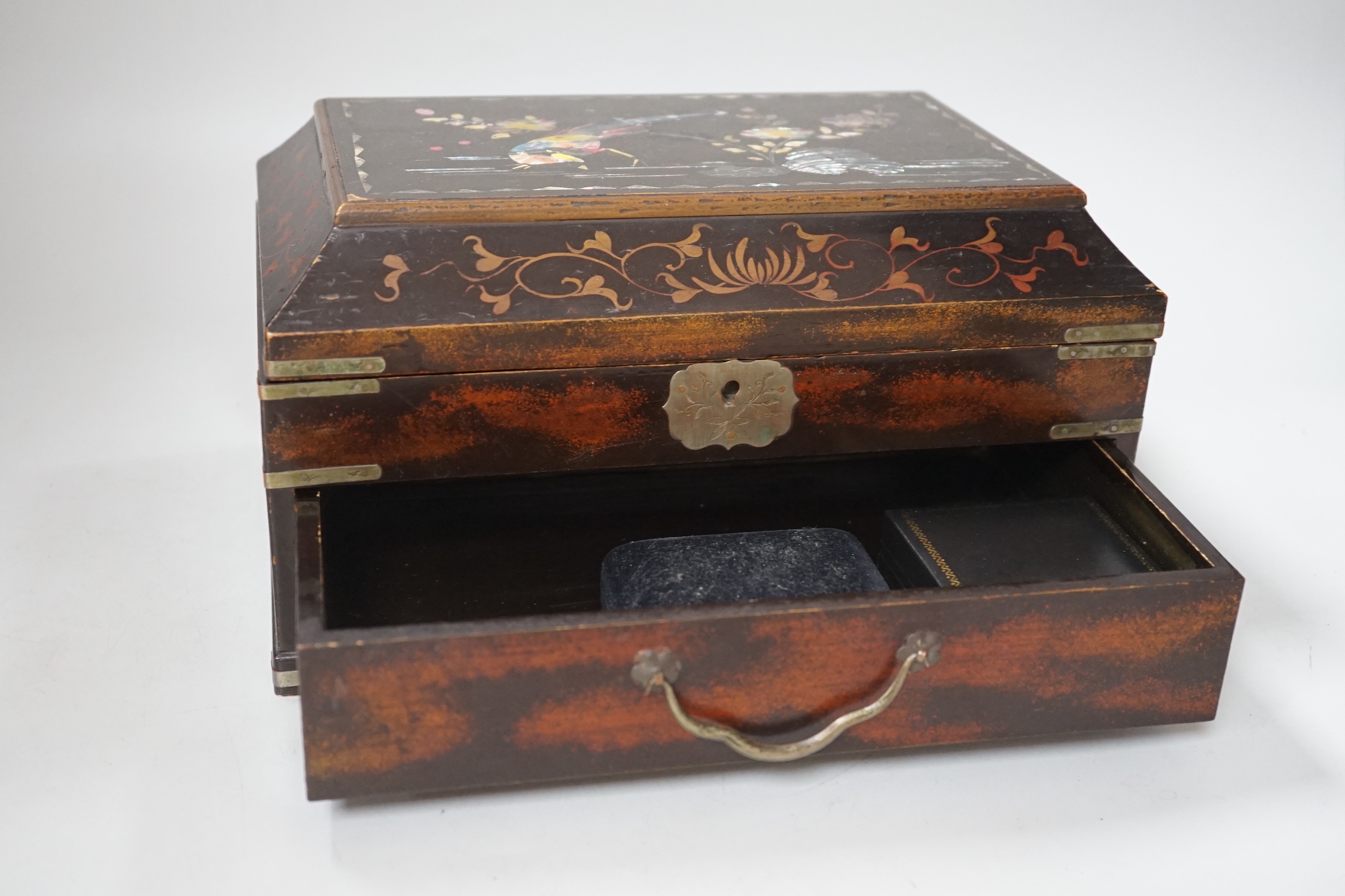 A 19th century Japanese abalone inlaid lacquered casket, 27cm wide